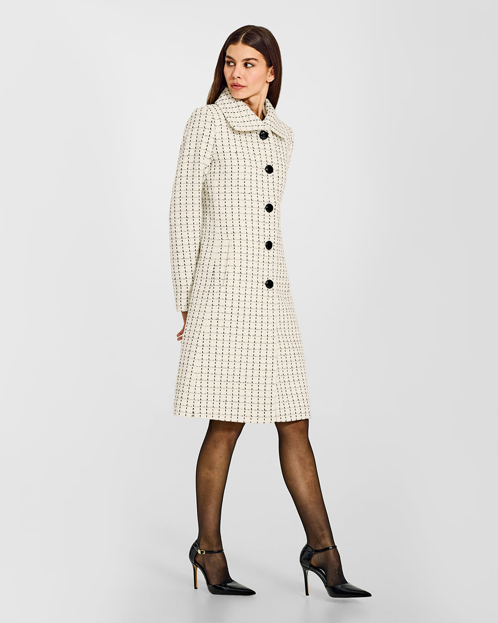 Sentaler Tweed Alpaca A-line Ivory Check Coat in Tweed Baby Alpaca wool. Seen from side on female model.