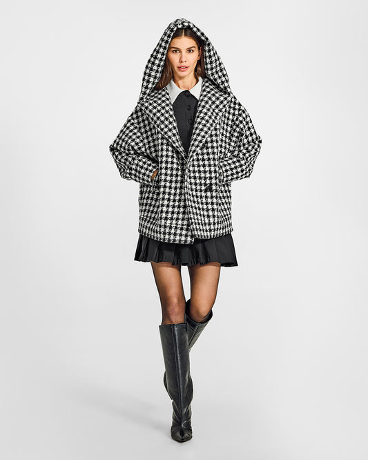 Sentaler Tweed Hooded Black and White Houndstooth Jacket in Tweed Suri Alpaca wool. Seen from front open with hood on female model.