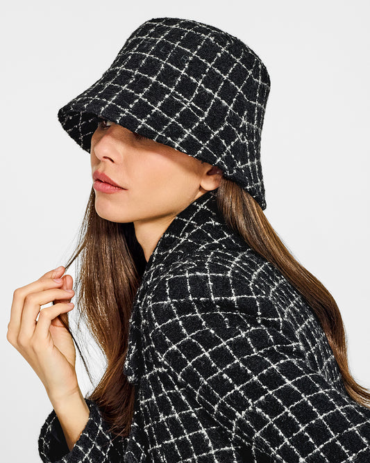 Sentaler Tweed Black Check Bucket Hat in Tweed Suri Alpaca wool. Seen from side close up on female model.