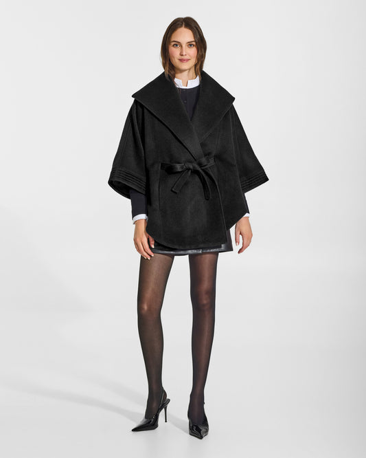 SENTALER Cape with Shawl Collar and Belt in Black, Baby Alpaca. Worn by a female model, front view, belted.