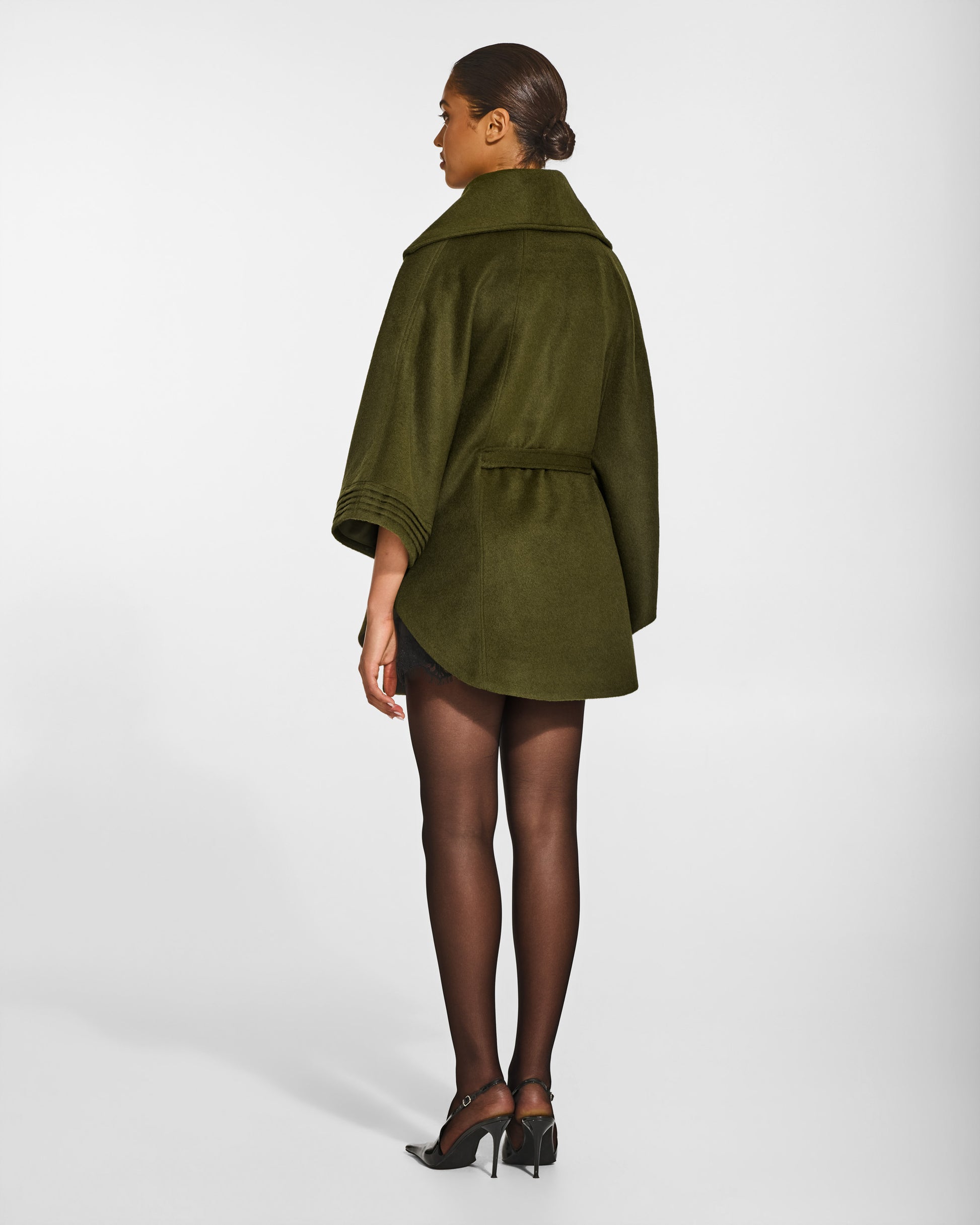 SENTALER Cape with Shawl Collar and Belt in Olive, Baby Alpaca. Worn by a female model, back view, belted.