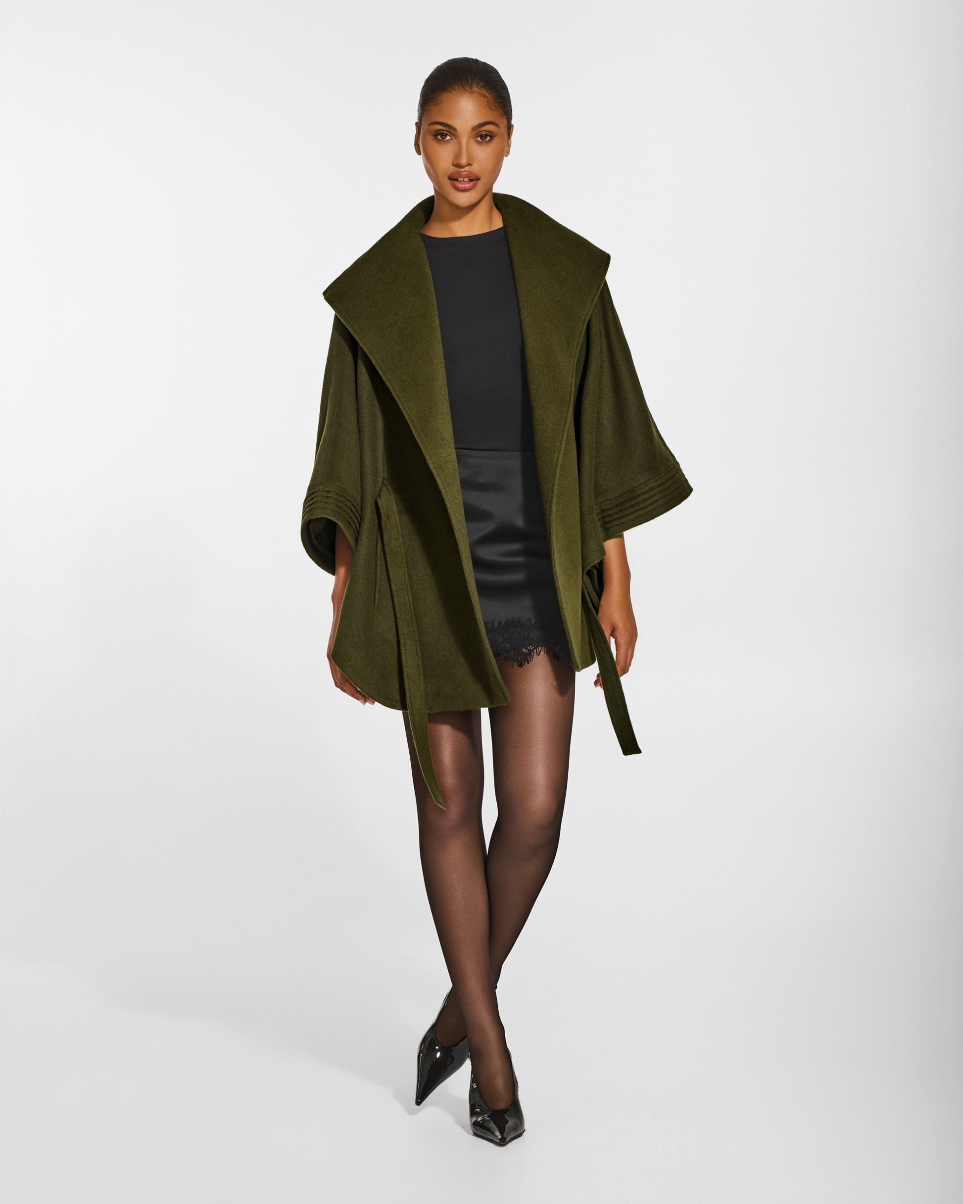 SENTALER Cape with Shawl Collar and Belt in Olive, Baby Alpaca. Worn by a female model, front view, open.