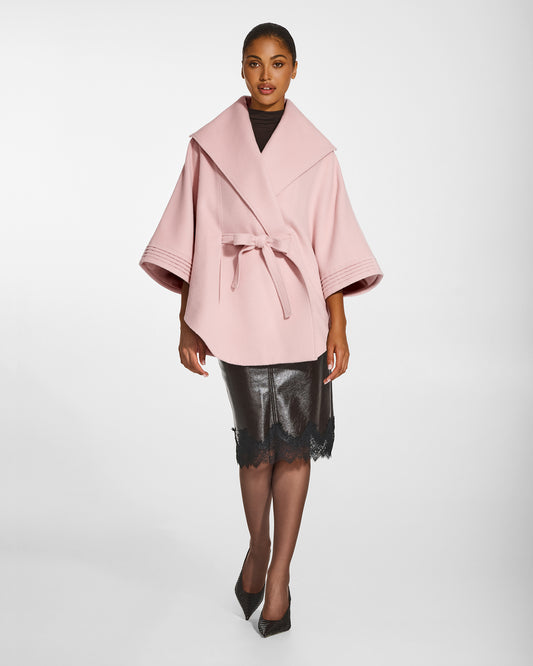 SENTALER Cape with Shawl Collar and Belt in Pink Frost, Baby Alpaca. Worn by a female model, front view, belted.