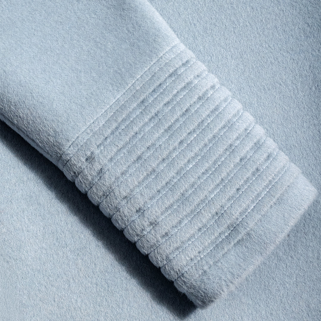 SENTALER Baby Alpaca fabric in Glacial Blue. Close-up flat lay swatch.