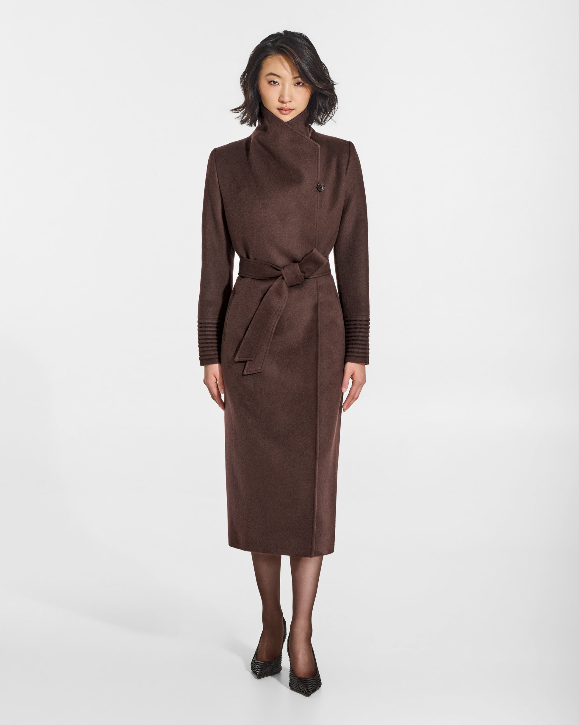 SENTALER Long Funnel Collar Wrap Coat in Chocolate Brown, Baby Alpaca. Worn by a female model, front view, belted.
