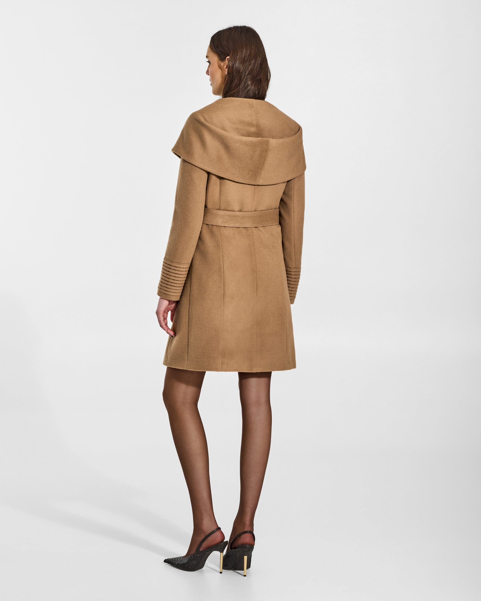 SENTALER Mid Length Hooded Wrap Coat in Dark Camel, Baby Alpaca. Worn by a female model, back view, belted.