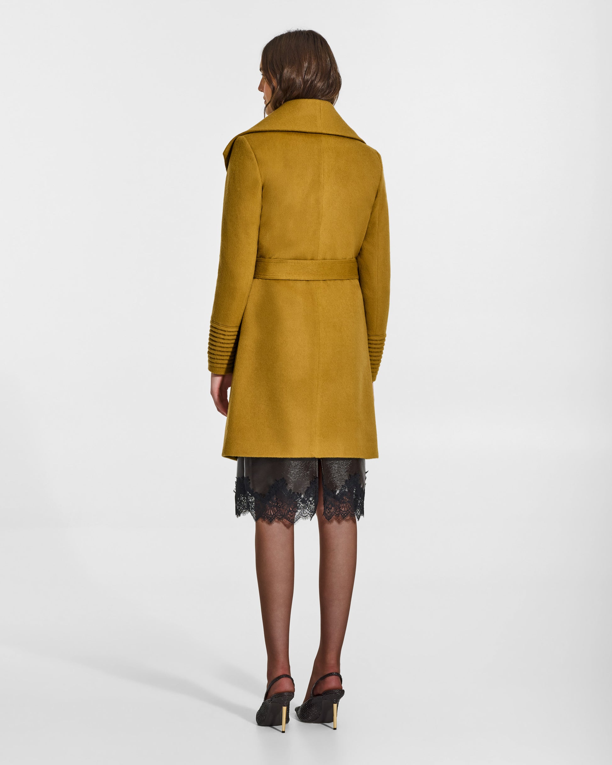 SENTALER Mid Length Shawl Collar Wrap Coat in Amber Haze, Baby Alpaca. Worn by a female model, back view, belted.