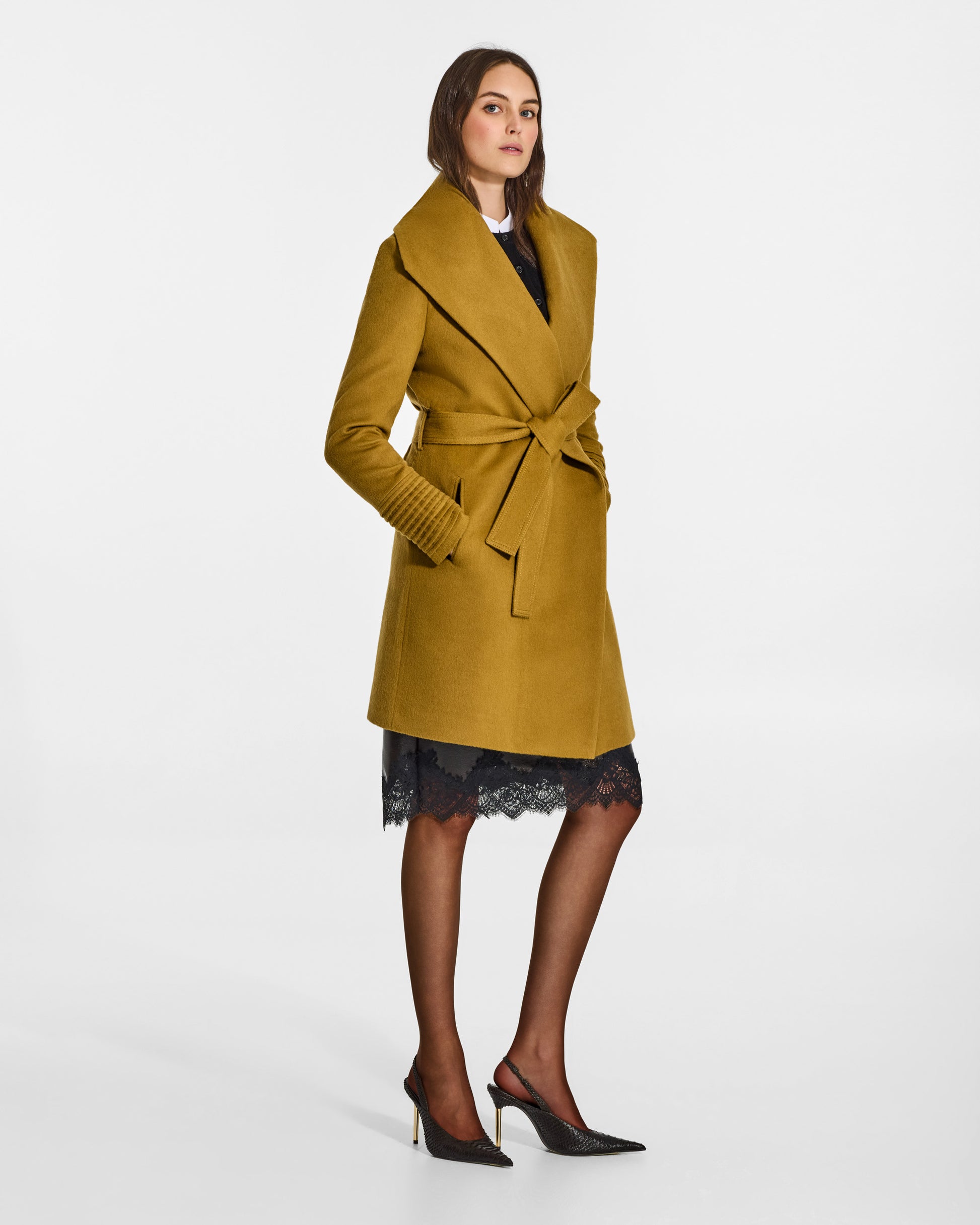 SENTALER Mid Length Shawl Collar Wrap Coat in Amber Haze, Baby Alpaca. Worn by a female model, side view, belted.