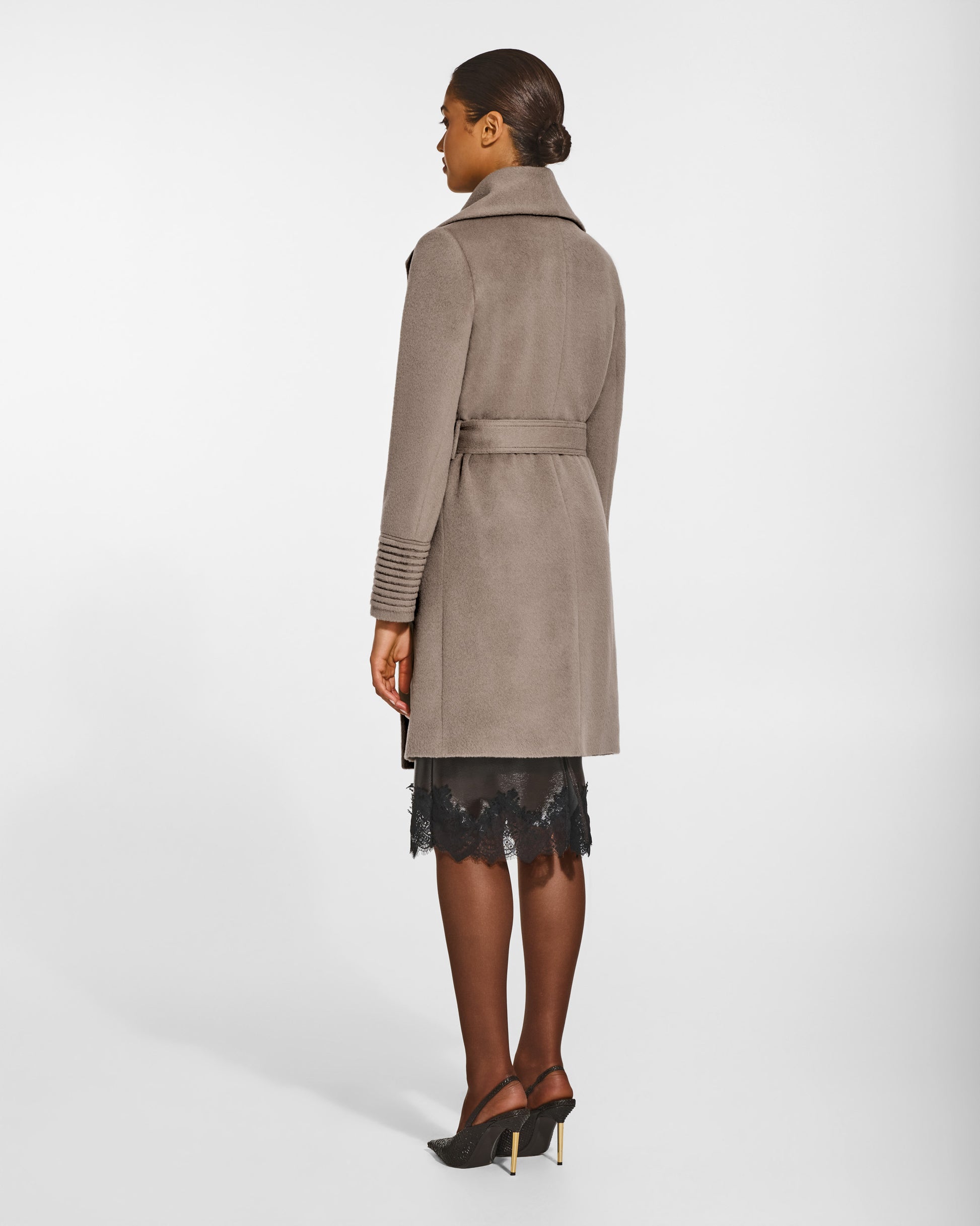 SENTALER Mid Length Shawl Collar Wrap Coat in Warm Taupe, Baby Alpaca. Worn by a female model, back view, belted.