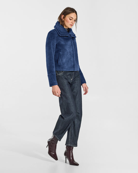 SENTALER Moto Jacket with Signature Double Collar in Classic Blue, Bouclé Alpaca. Worn by a female model, side view, buttoned.