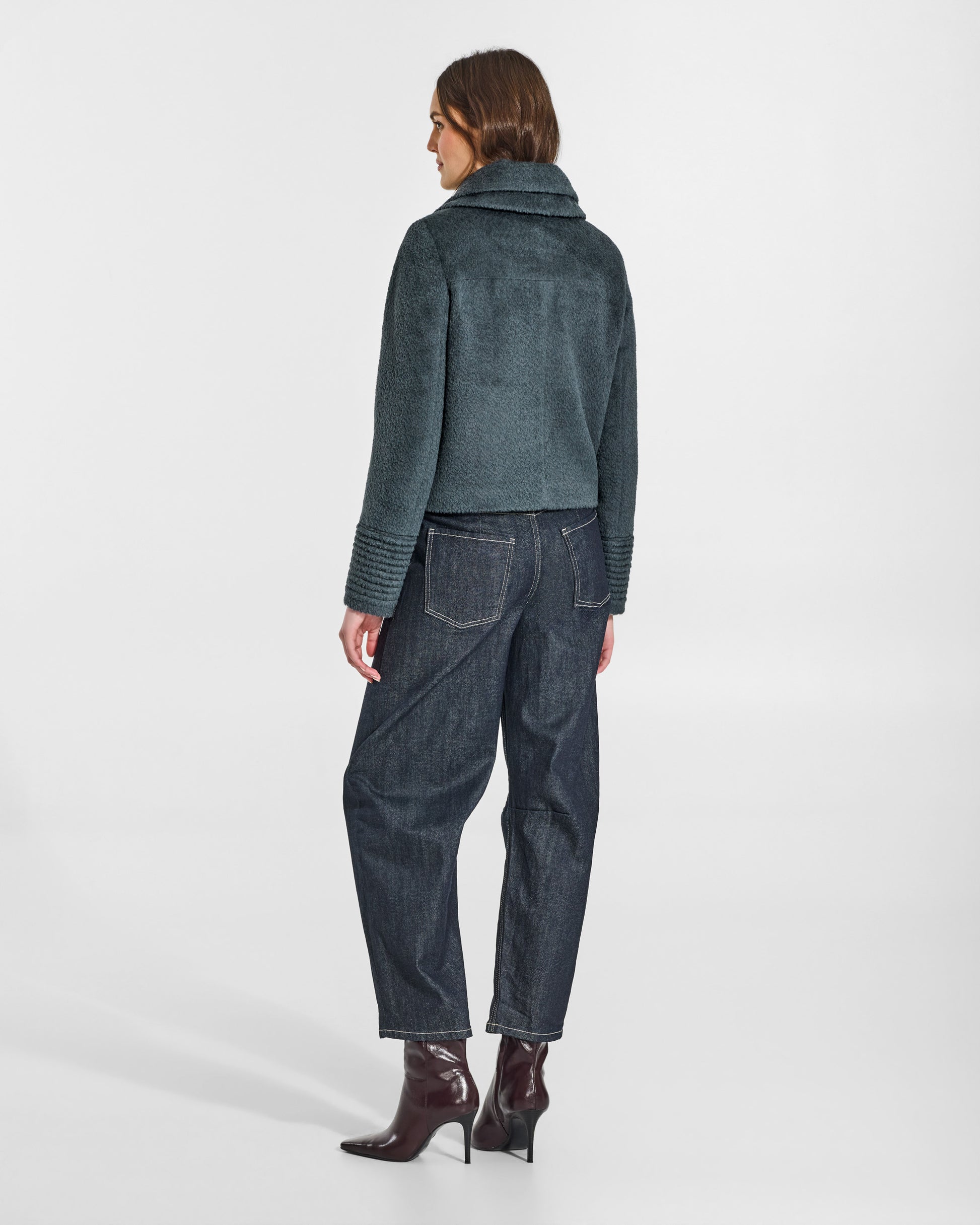 SENTALER Moto Jacket with Signature Double Collar in Graphite, Bouclé Alpaca. Worn by a female model, back view, buttoned.