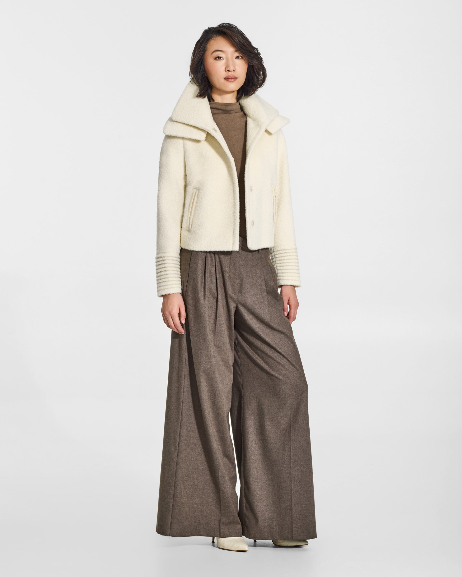 SENTALER Moto Jacket with Signature Double Collar in Ivory, Bouclé Alpaca. Worn by a female model, front view, open.