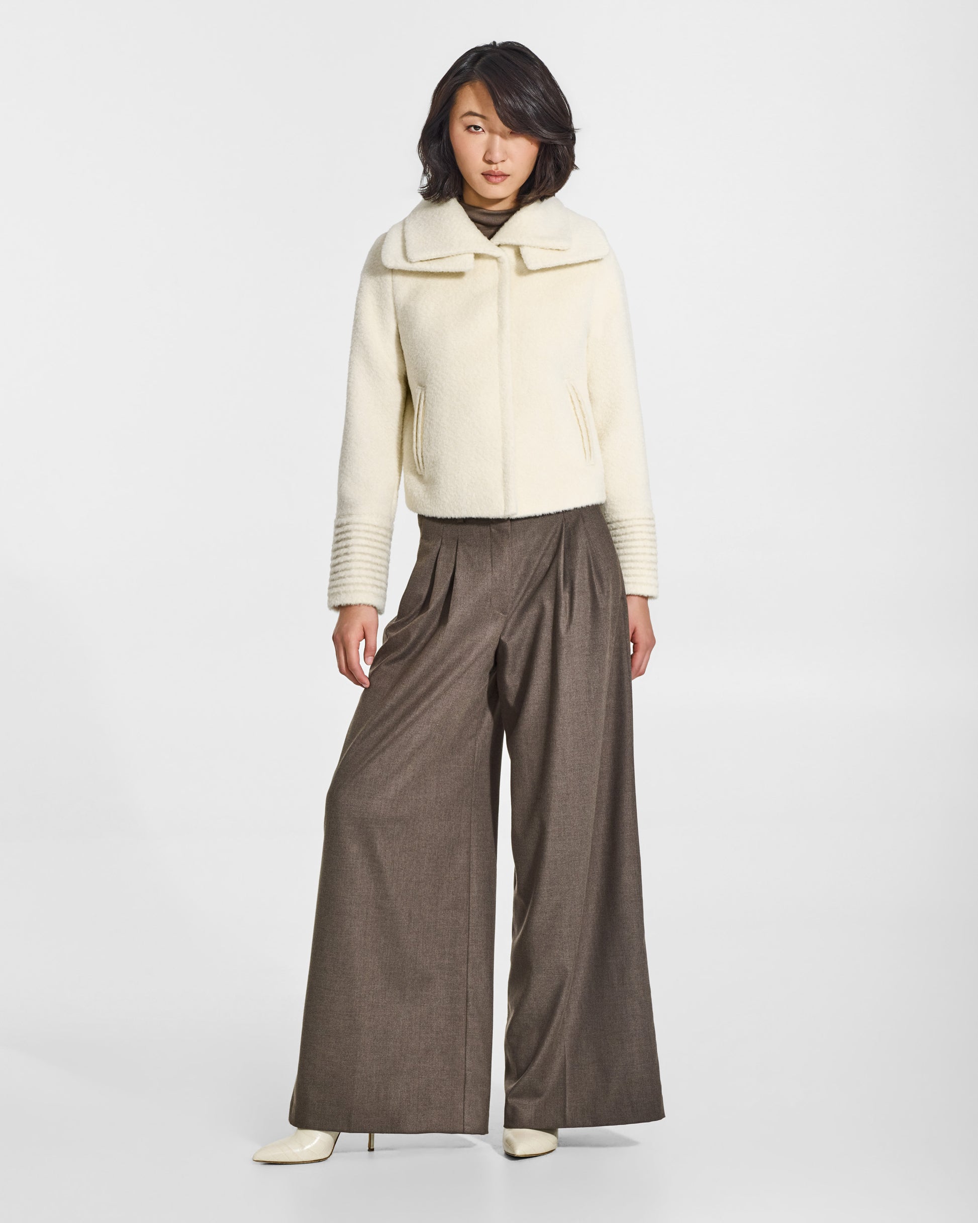 SENTALER Moto Jacket with Signature Double Collar in Ivory, Bouclé Alpaca. Worn by a female model, front view, buttoned.