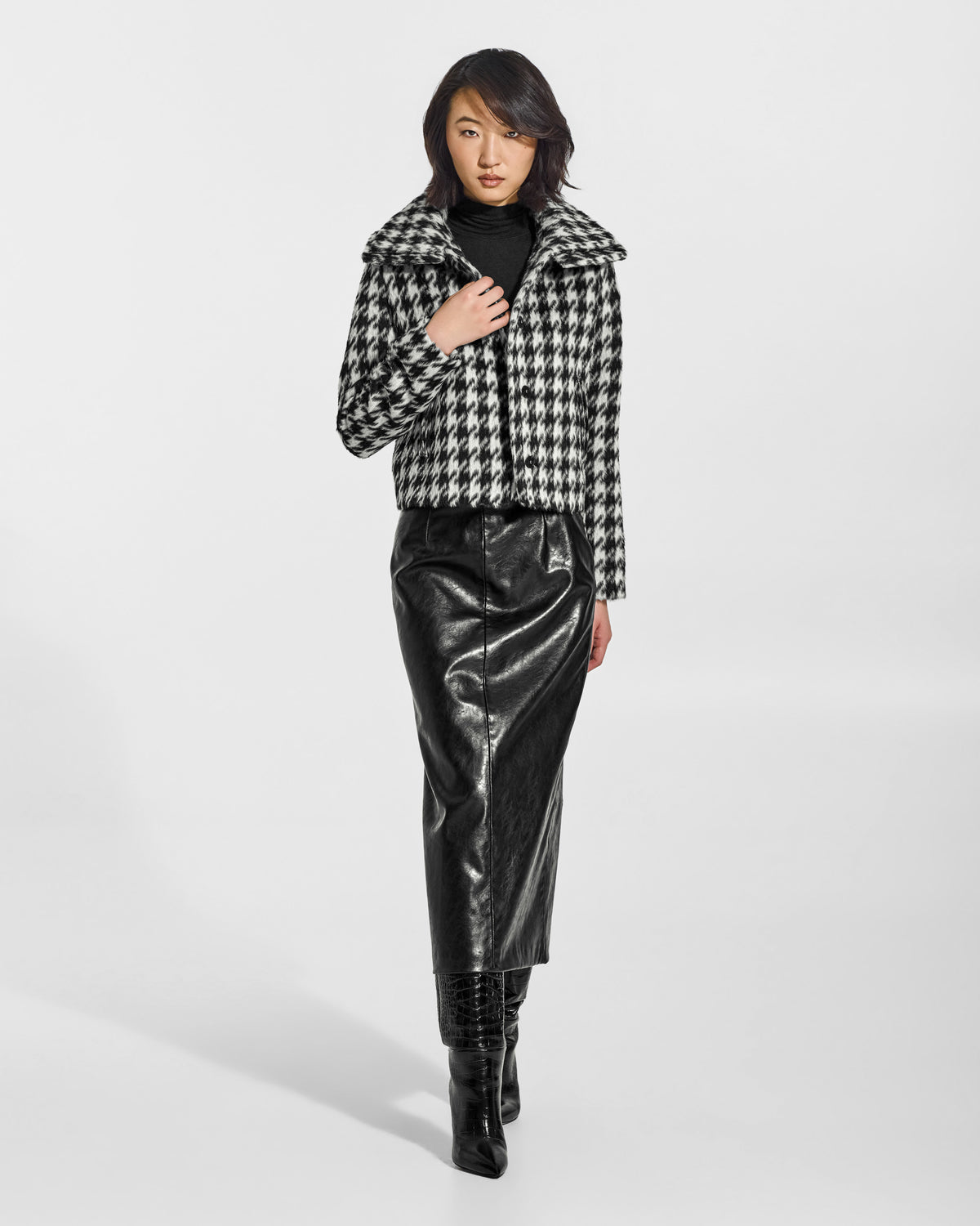 SENTALER Moto Jacket with Signature Double Collar in Houndstooth, Suri Alpaca. Worn by a female model, front view, open.