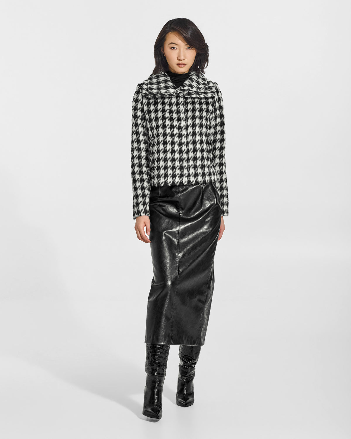 SENTALER Moto Jacket with Signature Double Collar in Houndstooth, Suri Alpaca. Worn by a female model, front view, buttoned.