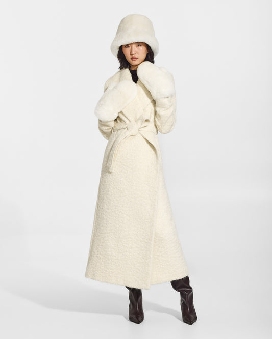 SENTALER Oversized Shearing Mittens in Ivory, Alpaca Shearling. Worn by a female model, front view.