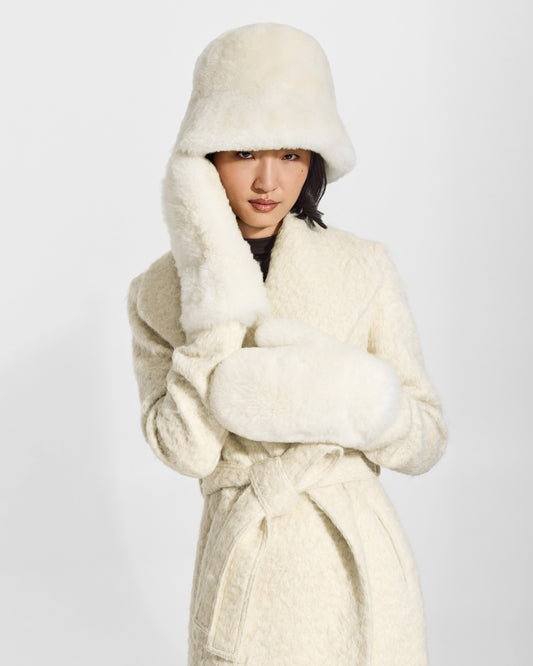 SENTALER Oversized Shearing Bucket Hat in Ivory, Alpaca Shearling. Worn by a female model, front view.