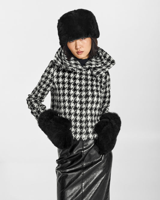 SENTALER Oversized Shearing Mittens in Black, Alpaca Shearling. Worn by a female model, front view.