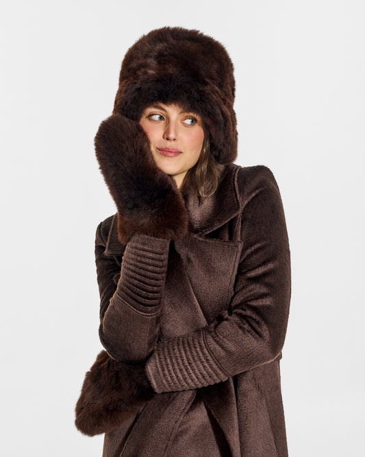 SENTALER Oversized Shearing Mittens in Chocolate Brown, Alpaca Shearling. Worn by a female model, front view, close-up.