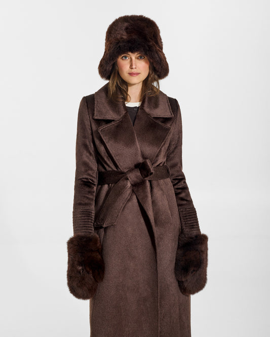 SENTALER Oversized Shearing Mittens in Chocolate Brown, Alpaca Shearling. Worn by a female model, front view.