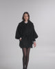 SENTALER Cape with Shawl Collar and Belt in Black, Baby Alpaca. Product video, worn by a female model, full-length and detail views of the fabric and finishing.