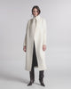 SENTALER Long Funnel Collar Wrap Coat in Ivory, Baby Alpaca. Product video, worn by a female model, full-length and detail views of the fabric and finishing.