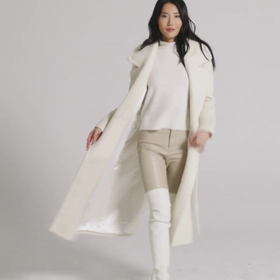 Sentaler Long Notched Collar Wrap Ivory White Coat in Bouclé Alpaca wool. Seen as product video with female model.