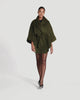 SENTALER Cape with Shawl Collar and Coat in Olive Green, Baby Alpaca. Product video, worn by a female model, full-length and detail views of the fabric and finishing.