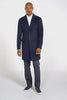 Sentaler deep navy overcoat made of baby alpaca wool with a notched lapel, on male model.