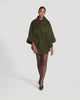 SENTALER Cape with Shawl Collar and Coat in Olive Green, Baby Alpaca. Product video, worn by a female model, full-length and detail views of the fabric and finishing.