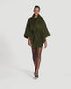 SENTALER Cape with Shawl Collar and Coat in Olive, Baby Alpaca. Product video, worn by a female model, full-length and detail views of the fabric and finishing.