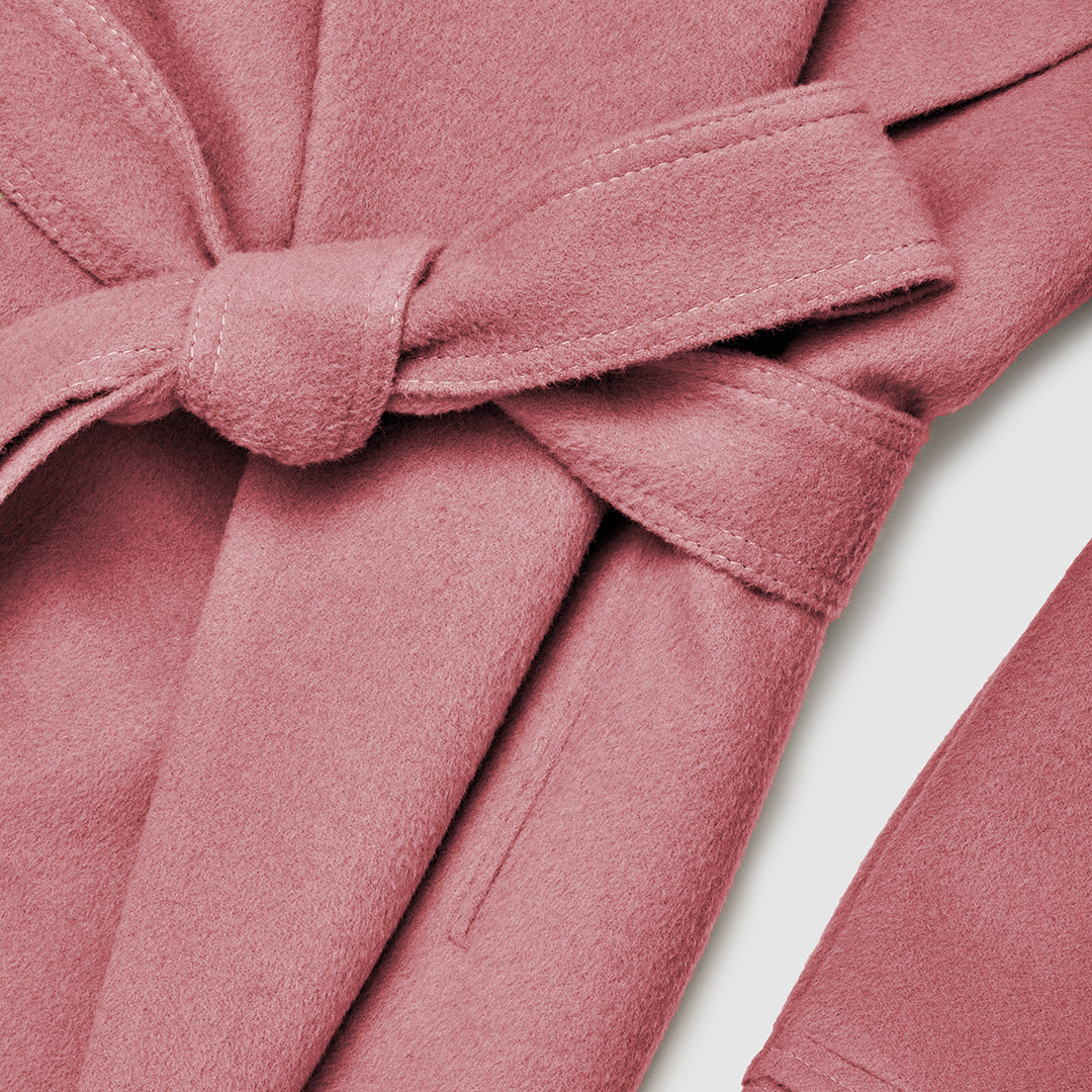 SENTALER Baby Alpaca Mid Length Shawl Collar Wrap Coat in Dusty Pink, shown as a flatlay detail of the belted waist.