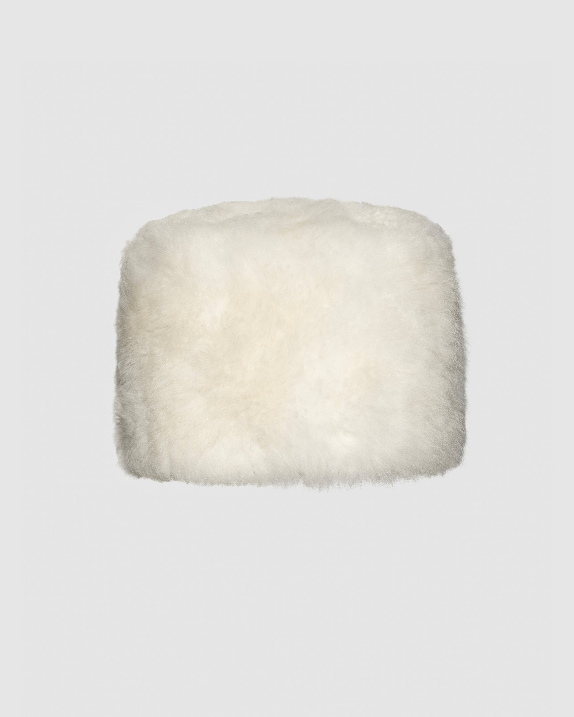 SENTALER Shearling Hat in Ivory, Alpaca Shearling. Off-figure.