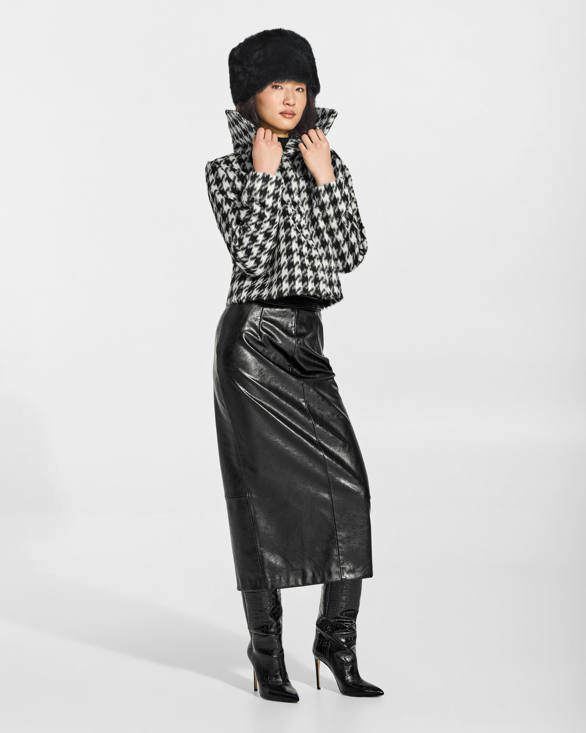 SENTALER Shearling Hat in Black, Alpaca Shearling. Worn by a female model, front view.