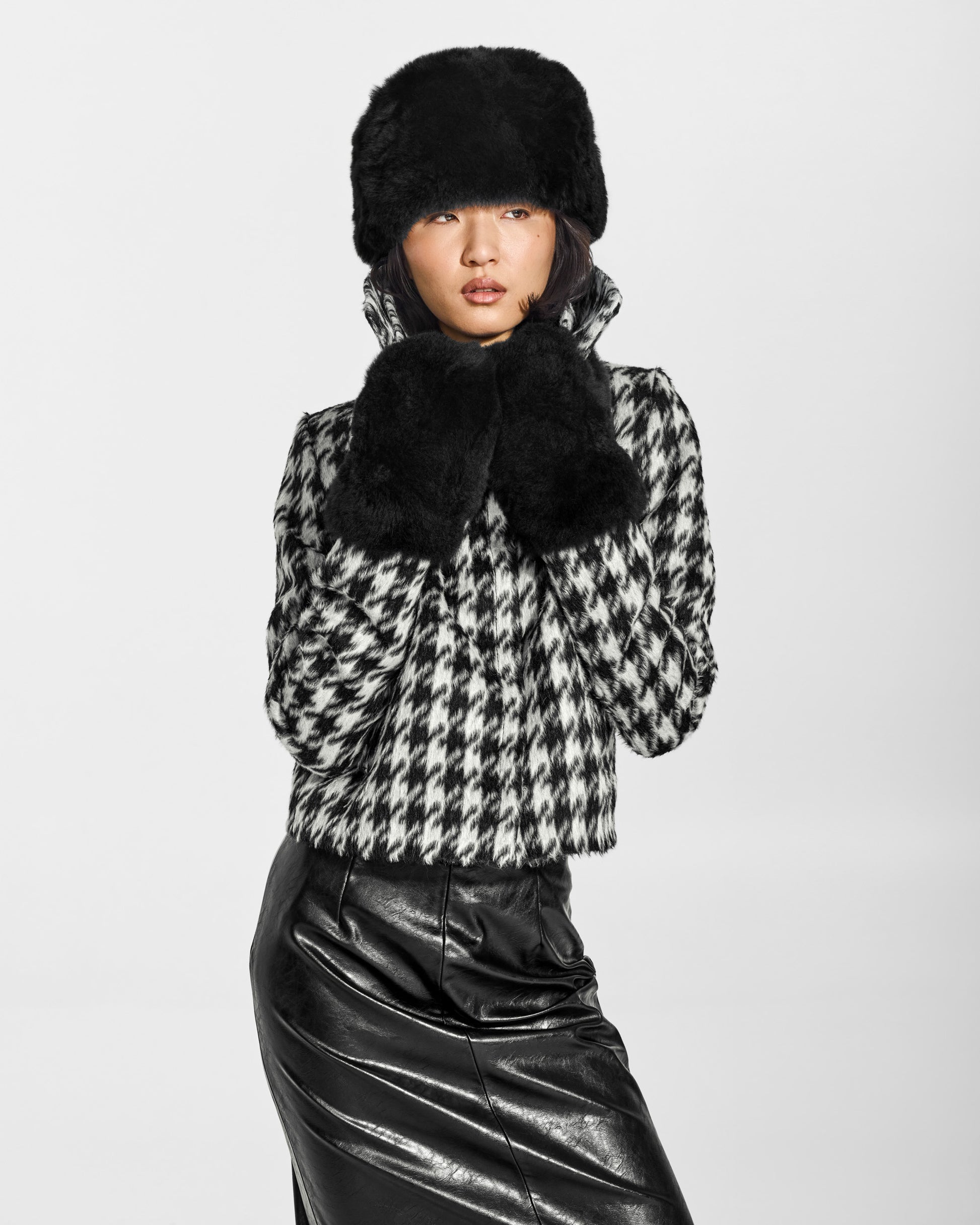 SENTALER Shearling Hat in Black, Alpaca Shearling. Worn by a female model, front view.