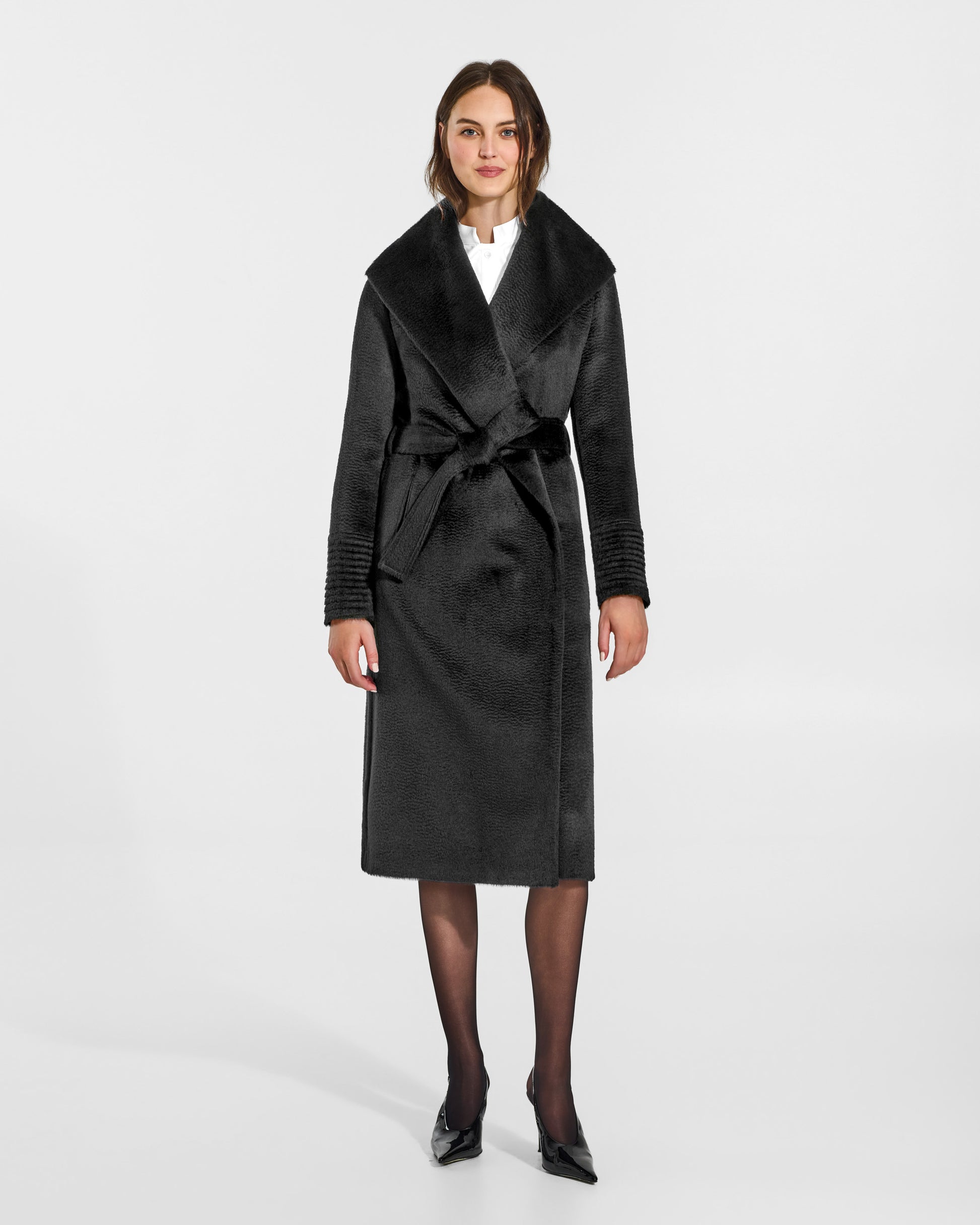 SENTALER Long Shawl Collar Wrap Coat in Black, Suri Alpaca. Worn by a female model, front view, belted.