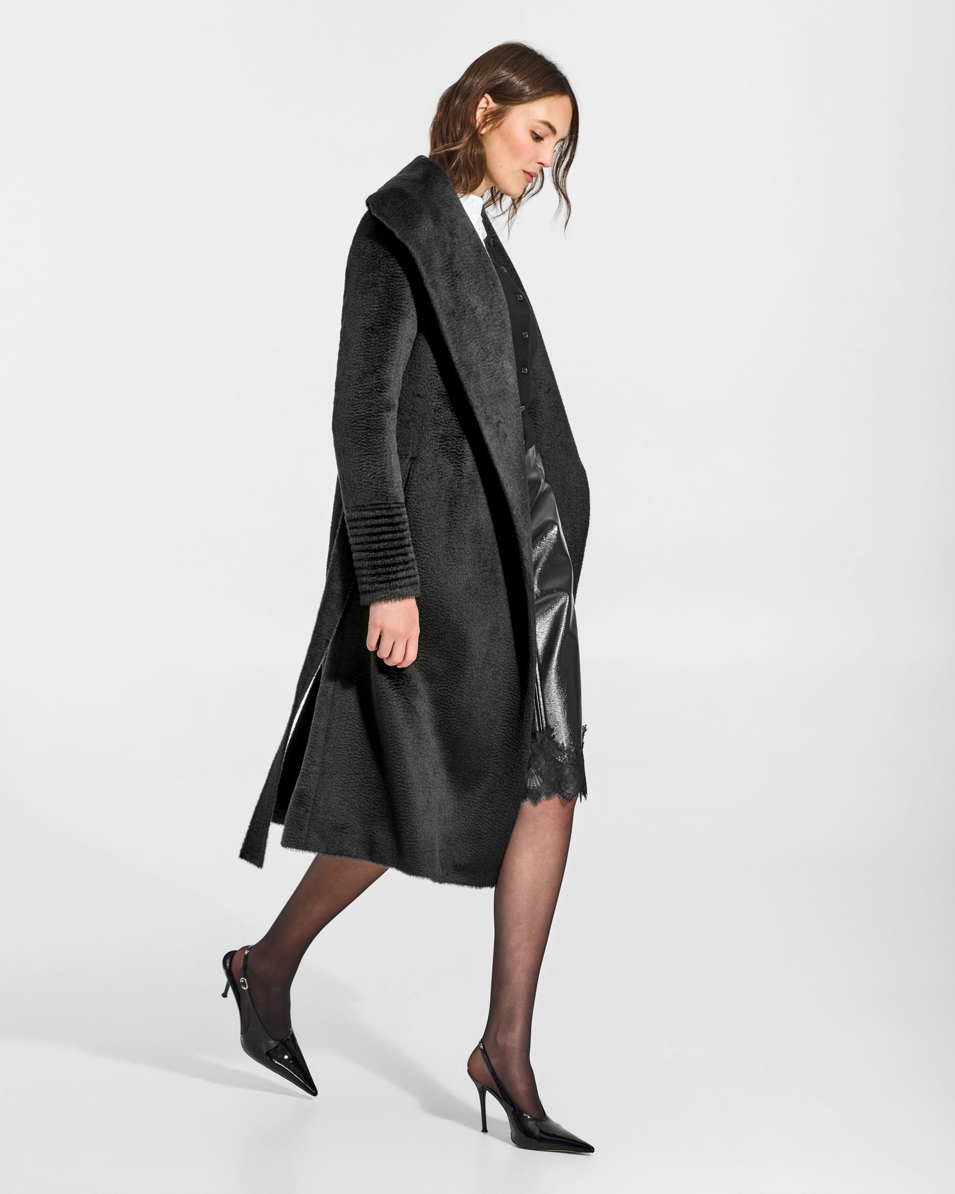 SENTALER Long Shawl Collar Wrap Coat in Black, Suri Alpaca. Worn by a female model, side view, open.