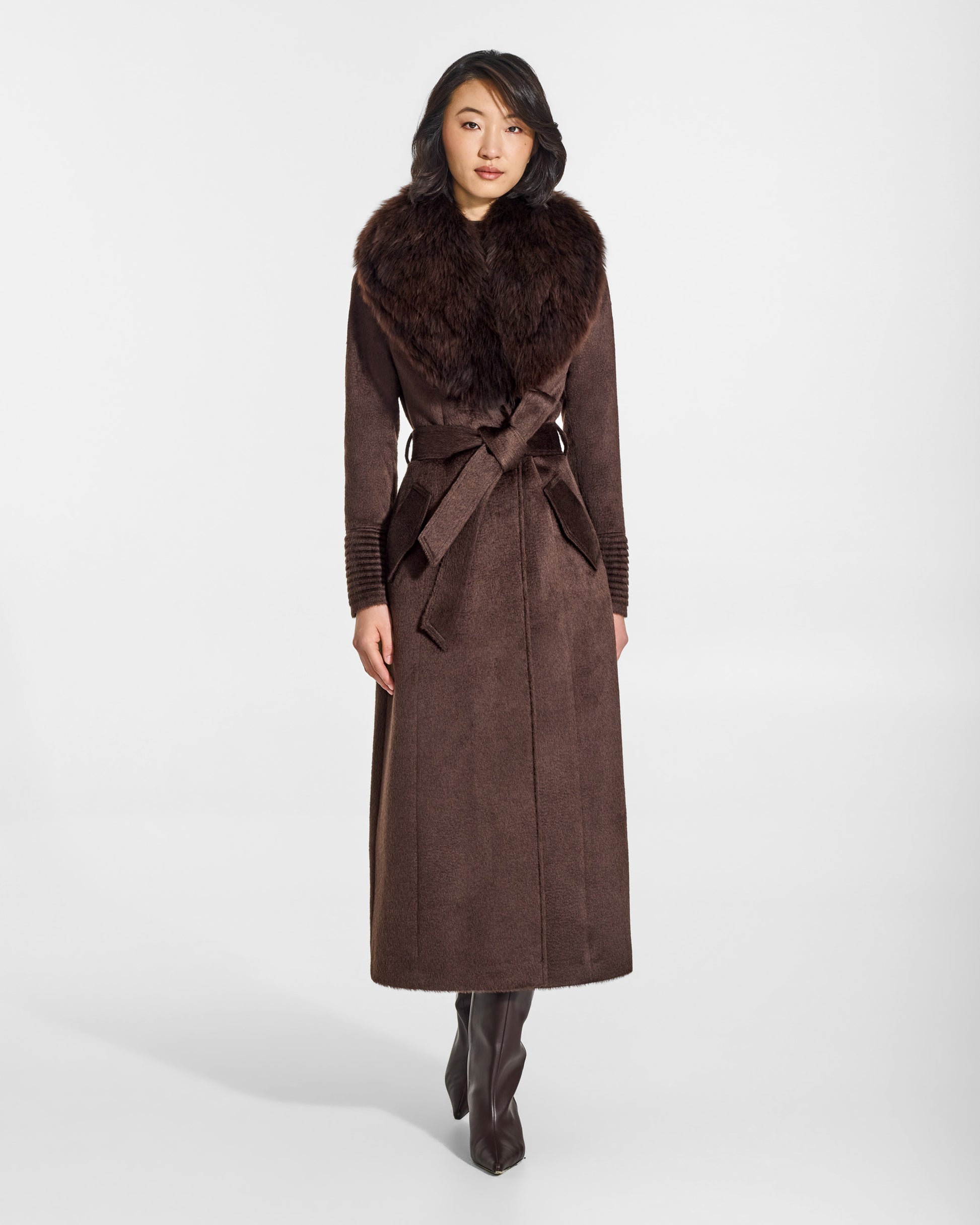 SENTALER Maxi Coat with Alpaca Shearling Collar in Chocolate Brown, Suri Alpaca. Worn by a female model, front view, belted.