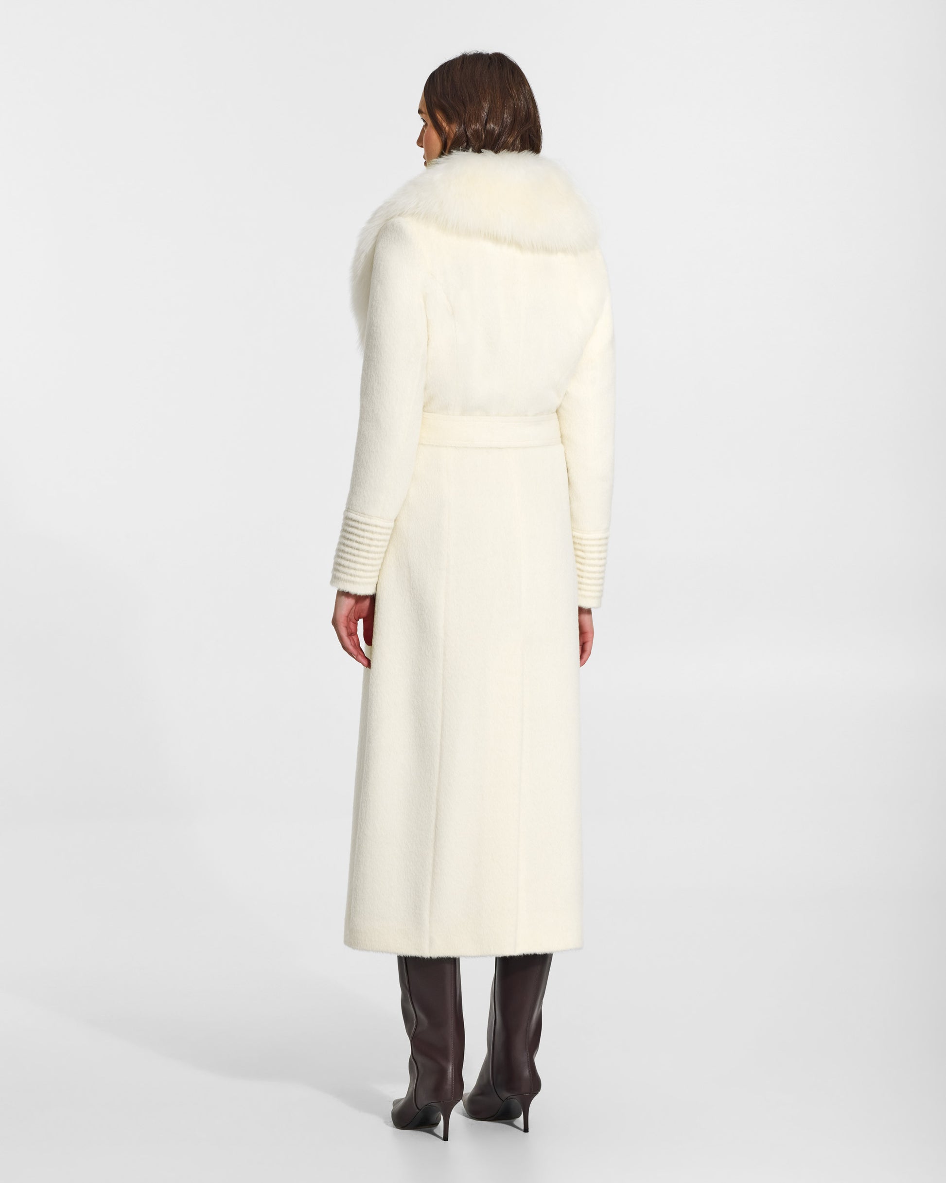 SENTALER Maxi Coat with Alpaca Shearling Collar in Ivory, Suri Alpaca. Worn by a female model, back view, belted.