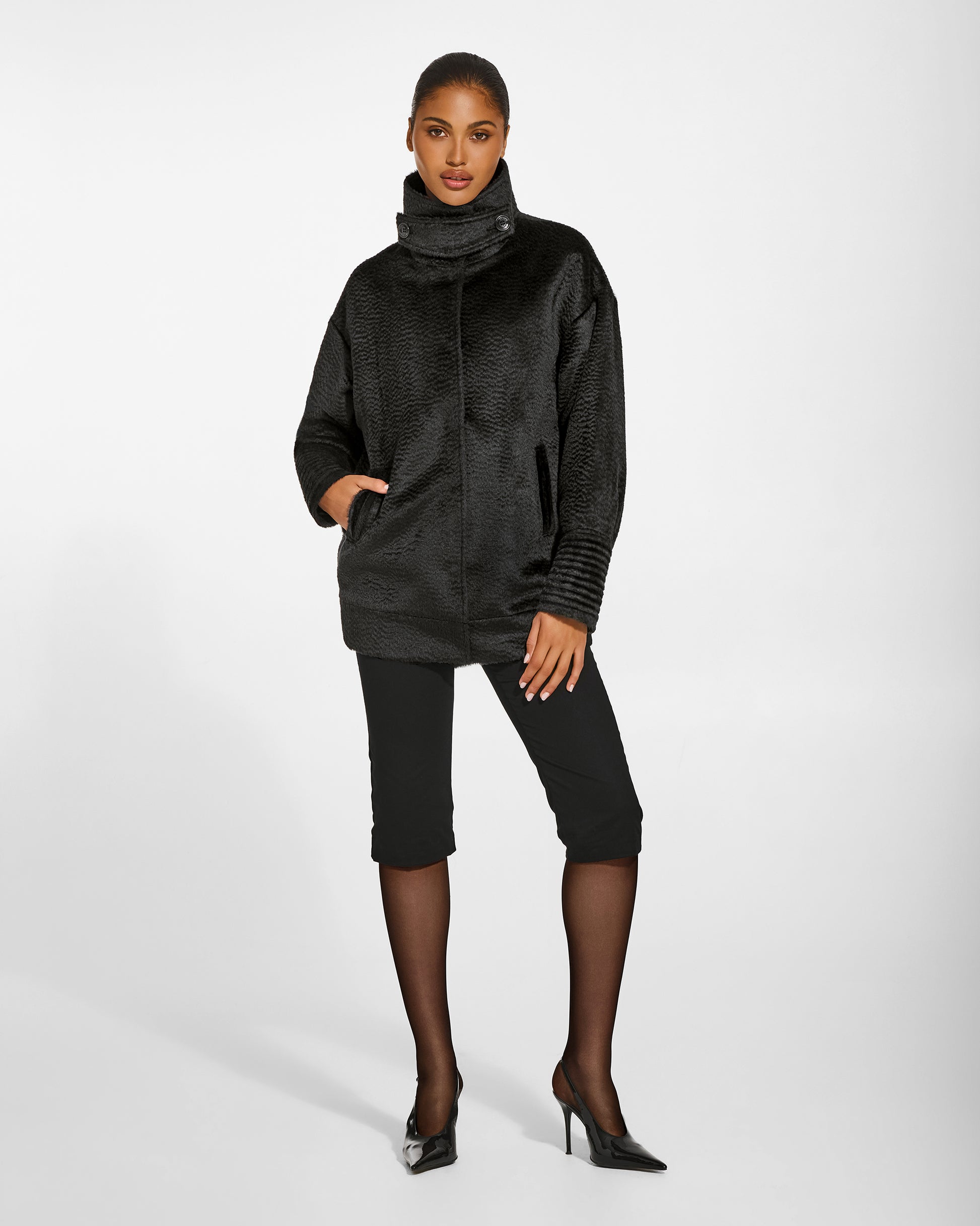 SENTALER Stand Collar Aviator Jacket in Black, Suri Alpaca. Worn by a female model, front view, buttoned.