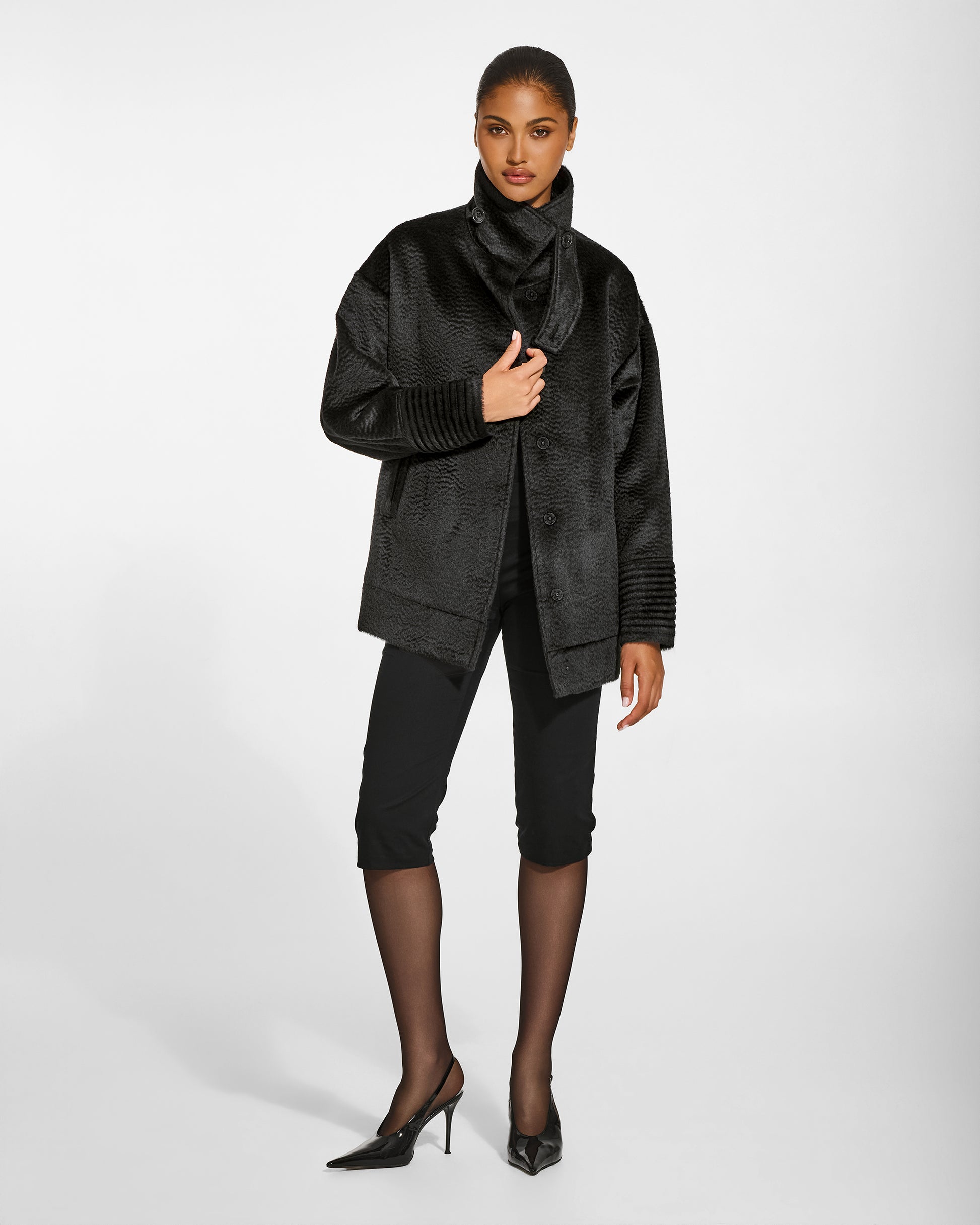 SENTALER Stand Collar Aviator Jacket in Black, Suri Alpaca. Worn by a female model, front view, open.