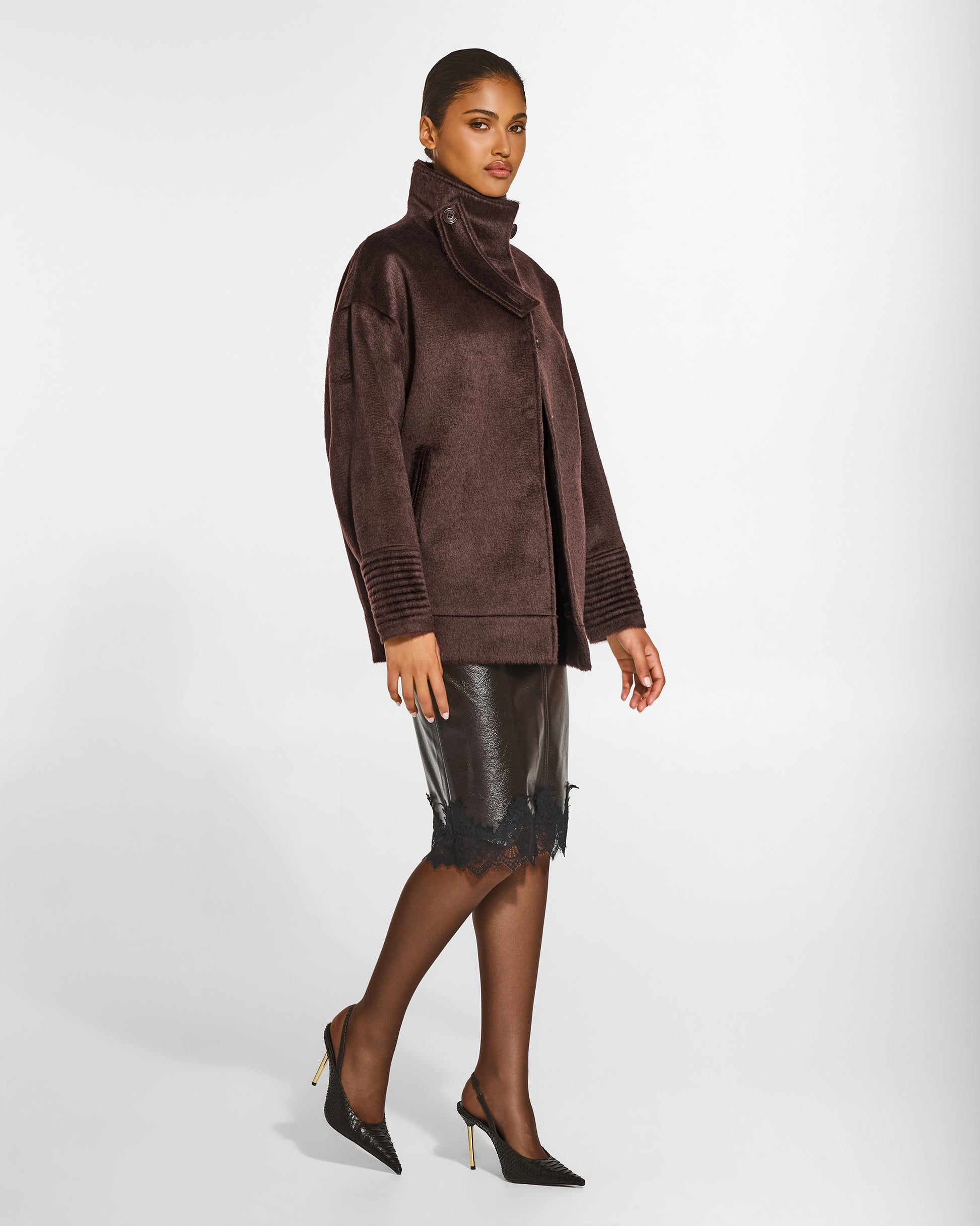 SENTALER Stand Collar Aviator Jacket in Chocolate Brown, Suri Alpaca. Worn by a female model, side view, open.