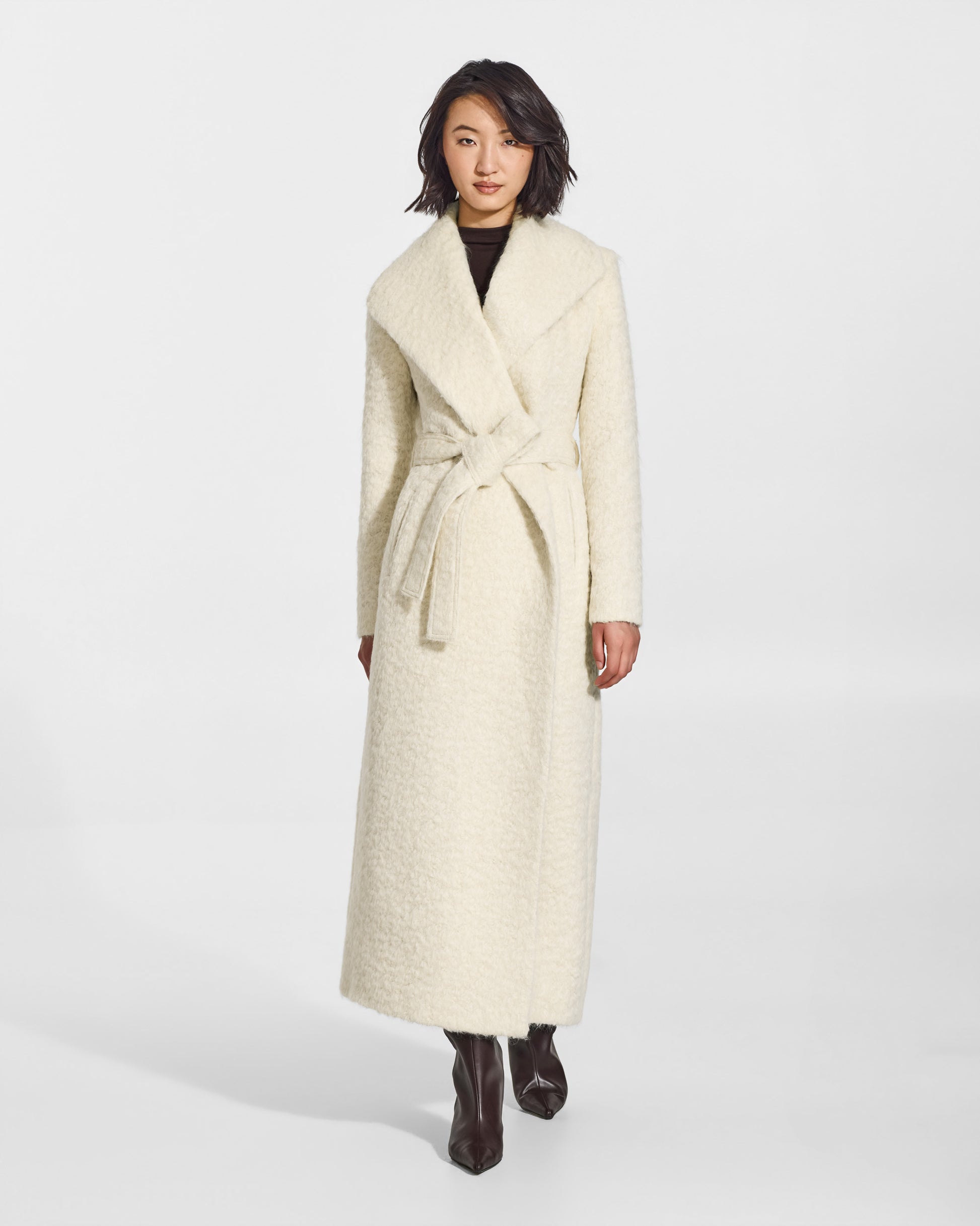 SENTALER Maxi Shawl Collar Wrap Coat in Cloud White, Textured Suri Alpaca. Worn by a female model, front view, belted.