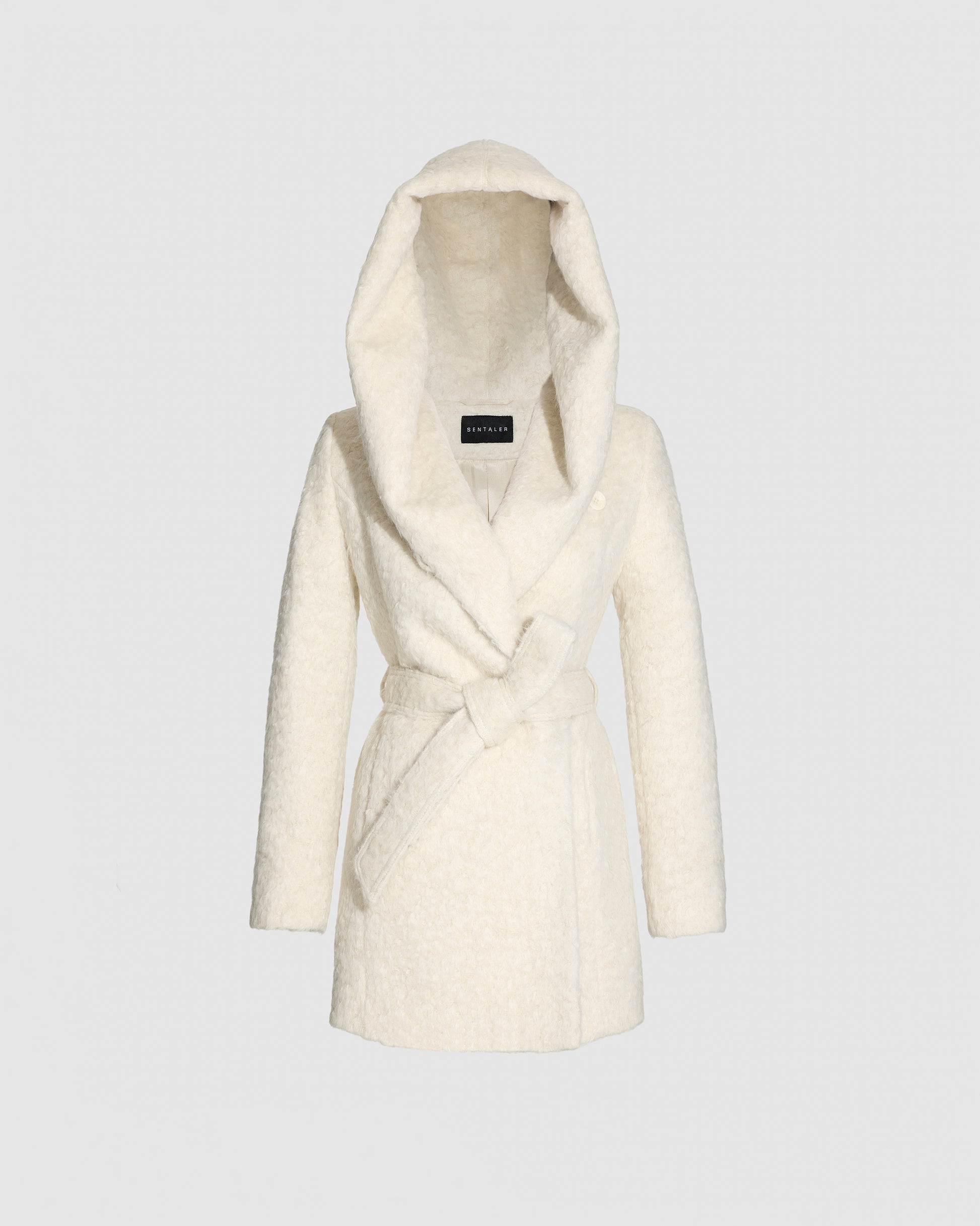 SENTALER Short Hooded Wrap Coat in Cloud White, Textured Suri Alpaca. Off-figure, belted.