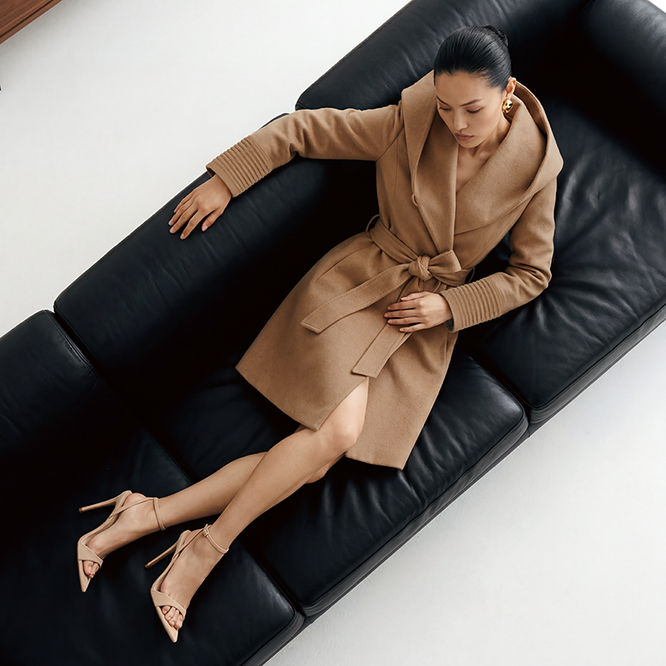 SENTALER Baby Alpaca Mid Length Hooded Wrap Coat in Dark Camel - seen on female model, from above, belted.