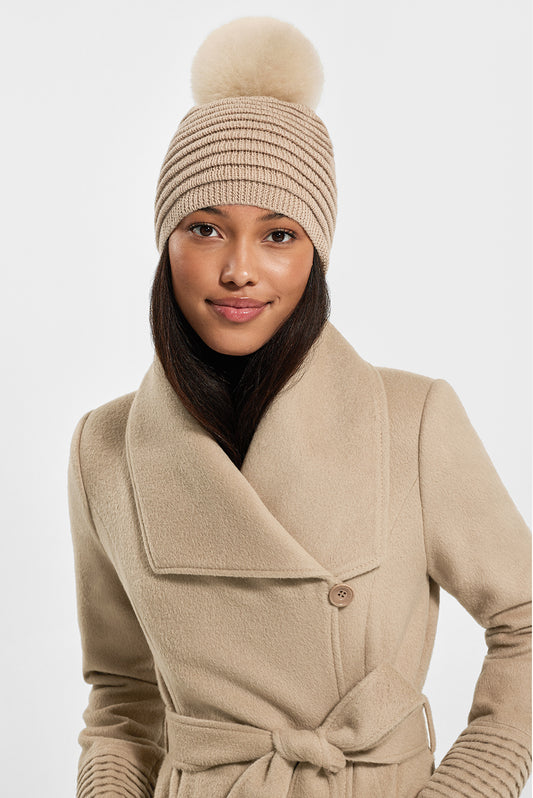 Sentaler Adult Ribbed Hat With Oversized Fur Pompon featured in Baby Alpaca and available in Camel. Seen from front on model.