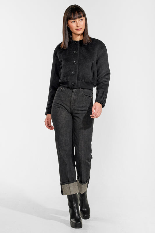 Sentaler Collarless Bomber Jacket with Knit Waistband featured in Baby Alpaca and available in Black. Seen from front on model.